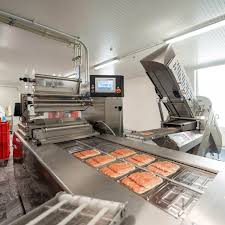 Cutting and slicing line at a food processing plant